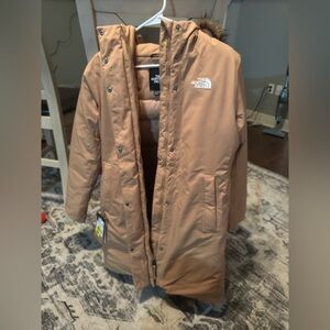 New North face Arctic's Parka Almond butter Size M.